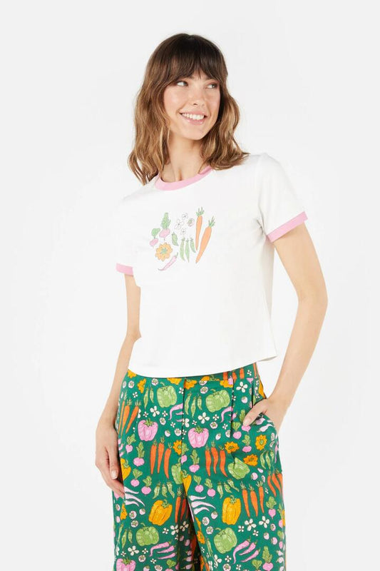 Image of a model wearing Tops. Productname: Market Day Tshirt in Cream colour by brand - Princess Highway