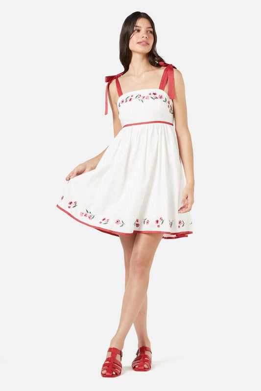 Image of a model wearing Dress. Productname: Poppy Emb Dress in Cream colour by brand - Princess Highway