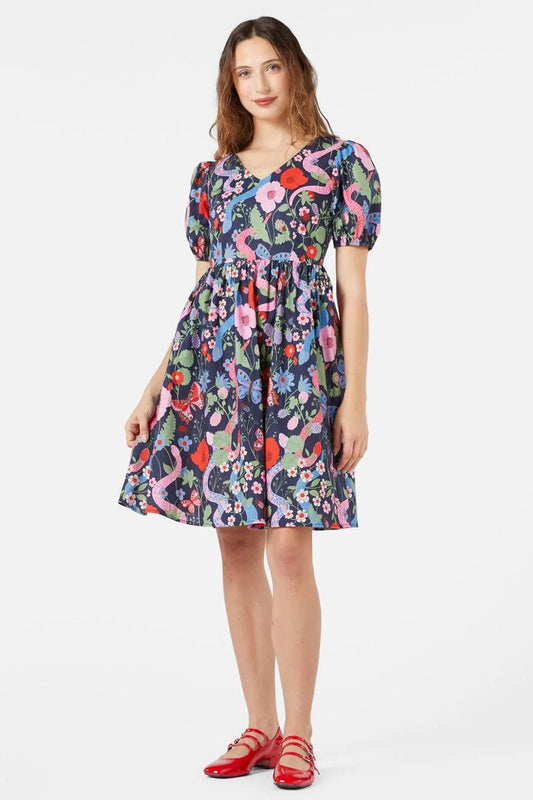 Image of a model wearing Dress. Productname: Luna Snake Dress in Navy colour by brand - Princess Highway