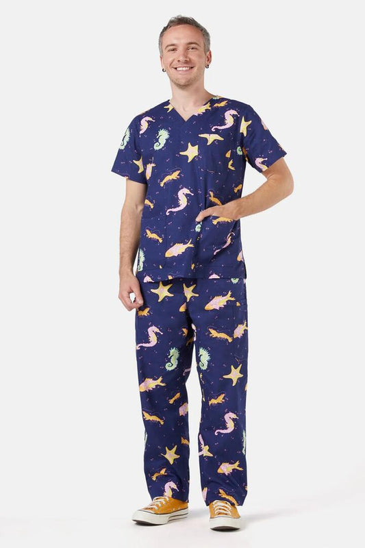 Image of a model wearing Uniforms & Workwear. Productname: Riptide Scrub Set in Navy colour by brand - Dangerfield