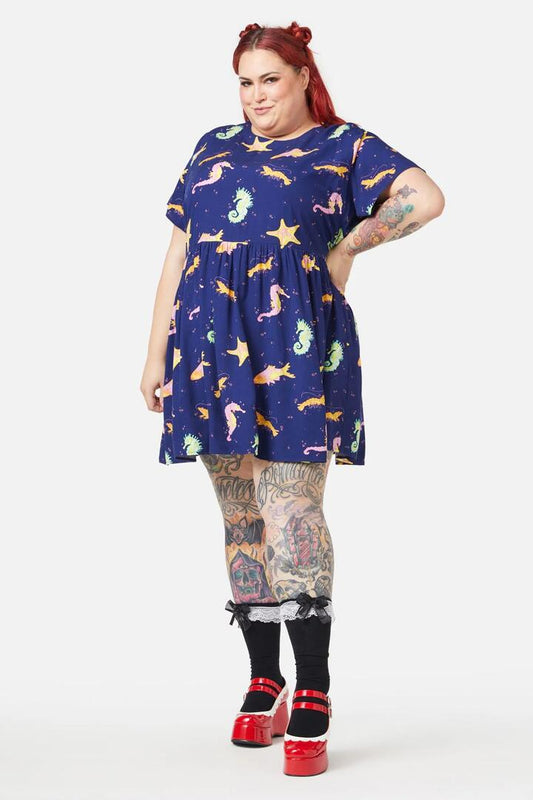 Image of a model wearing Dress. Productname: Curve Riptide Dress in Navy colour by brand - Dangerfield