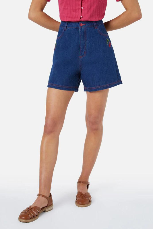 Image of a model wearing Shorts. Product name - Cherry Embroidered Short in Dark Denim colour by brand - Princess Highway