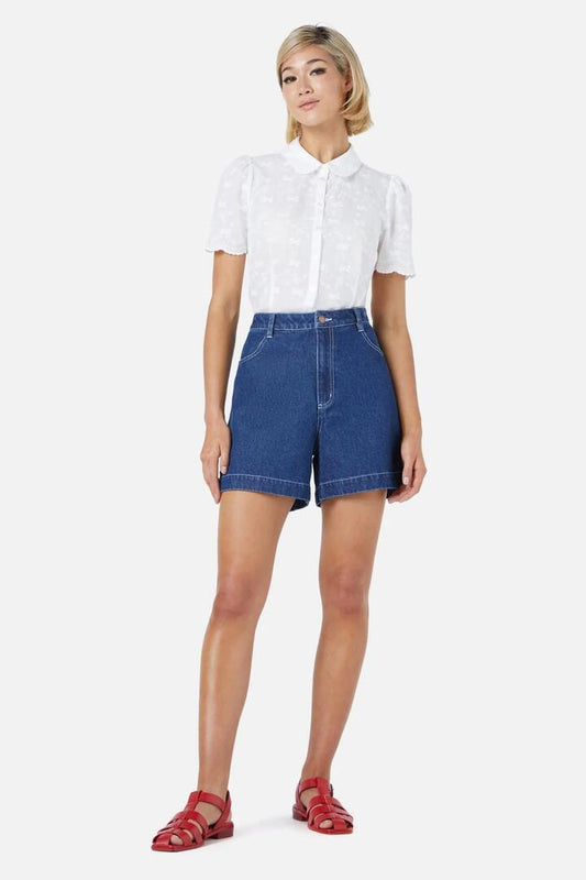 Image of a model wearing Shorts. Productname: Beautiful Bows Short in Dark Denim colour by brand - Princess Highway