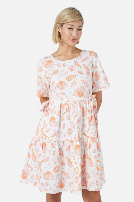 Image of a model wearing Dress. Productname: Sea Shell Smock Dress in Pink colour by brand - Princess Highway
