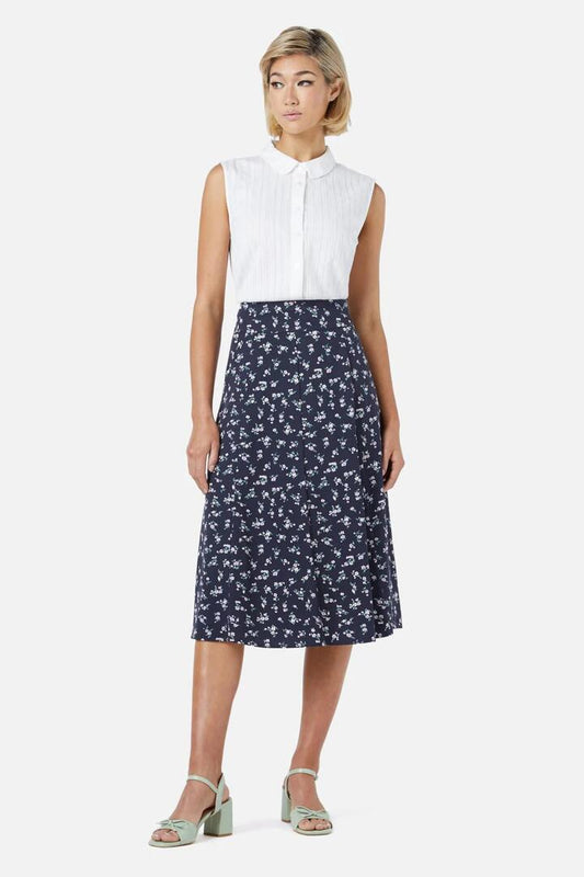 Image of a model wearing Skirts. Productname: Lila Ditsy Midi Skirt in Navy colour by brand - Princess Highway