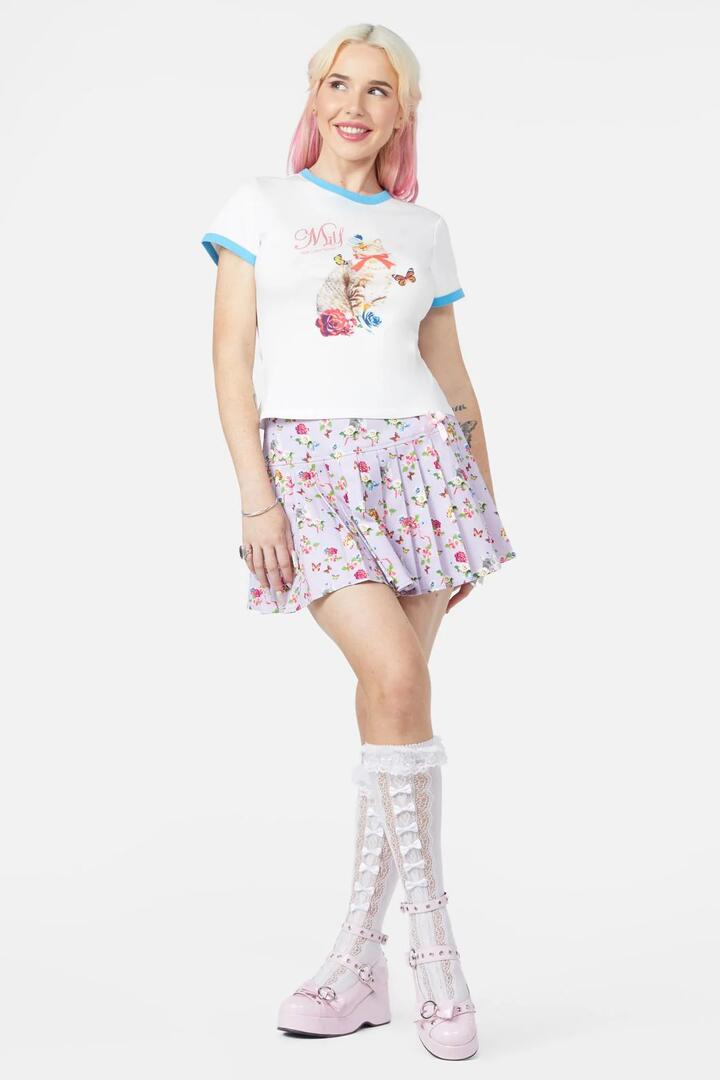 Image of a model wearing Tops. Productname: Milf Tee in Cream colour by brand - Dangerfield