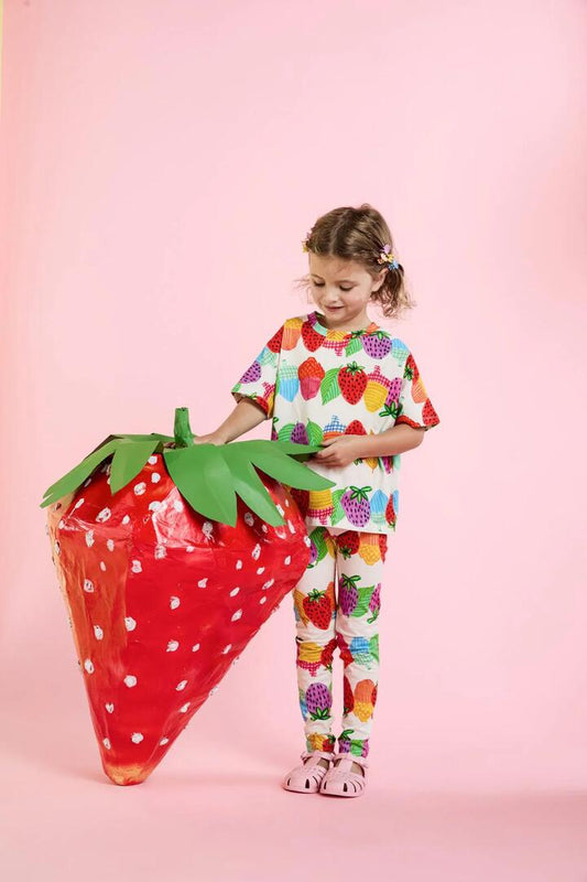 Image of a model wearing Tops. Productname: Acorn Stripe Kids Tee in Cream colour by brand - Princess Highway Kids