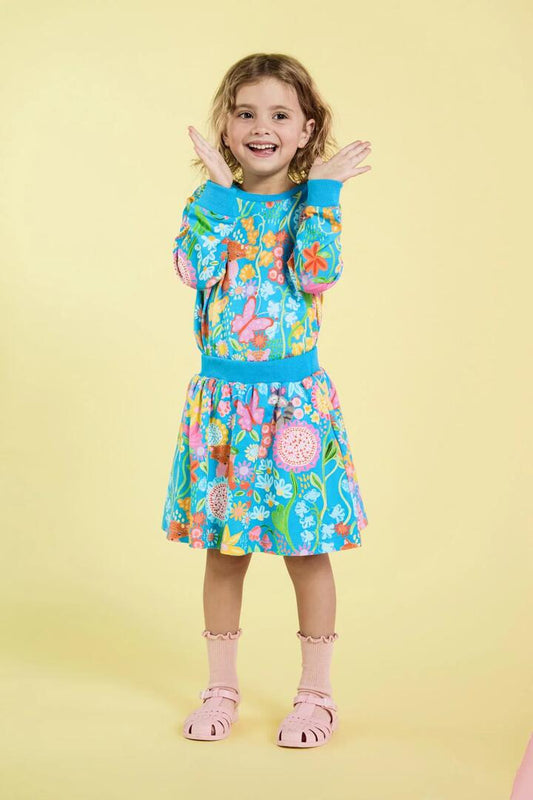 Image of a model wearing Skirts. Productname: Folk Flower Kids Skirt in Blue colour by brand - Princess Highway Kids