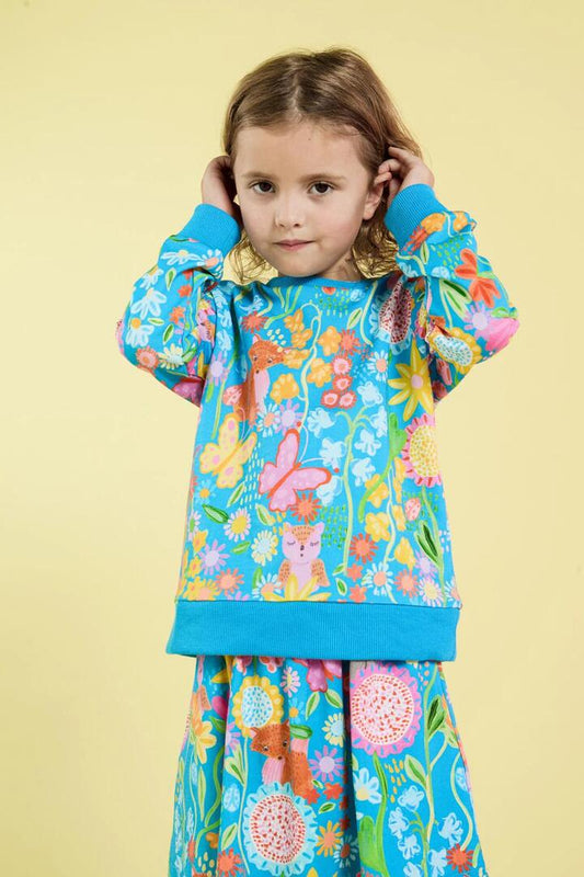 Image of a model wearing Outerwear. Productname: Folk Flower Kids Sweater in Blue colour by brand - Princess Highway Kids