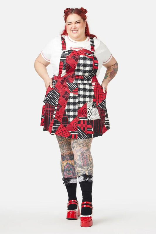 Image of a model wearing Dress. Productname: Curve Patched Up Pinafore in Multi colour by brand - Black Friday