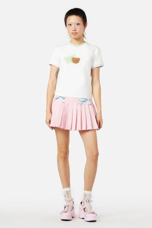 Image of a model wearing Tops. Productname: Vermont Patch Tee in White colour by brand - Dangerfield