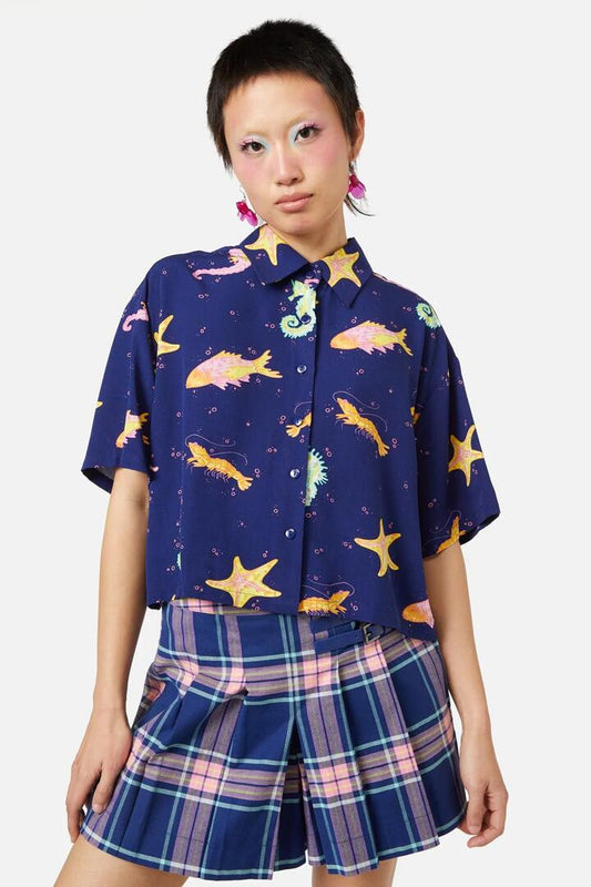 Image of a model wearing Tops. Productname: Riptide Blouse in Navy colour by brand - Dangerfield