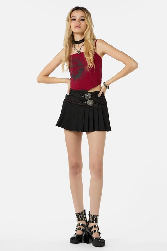 Image of a model wearing Skirts. Productname: Immaculate Mini Skort in Black colour by brand - Dangerfield