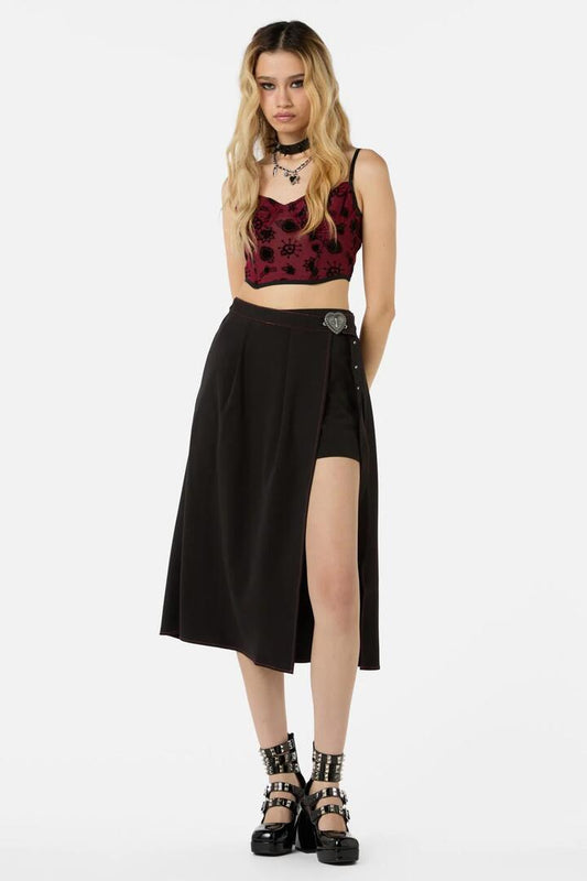 Image of a model wearing Skirts. Productname: Immaculate Midi Skort in Black colour by brand - Dangerfield