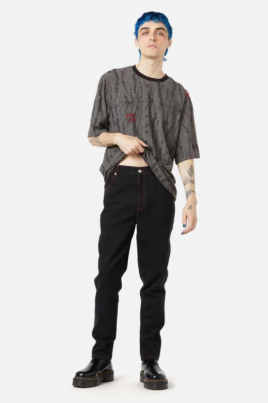 Image of a model wearing Denim. Productname: Contrast Stitch Unisex Skinny in Black colour by brand - Black Friday
