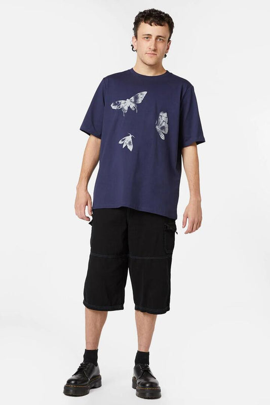 Image of a model wearing Tops. Productname: Mega Moth Tee in Navy colour by brand - Black Friday