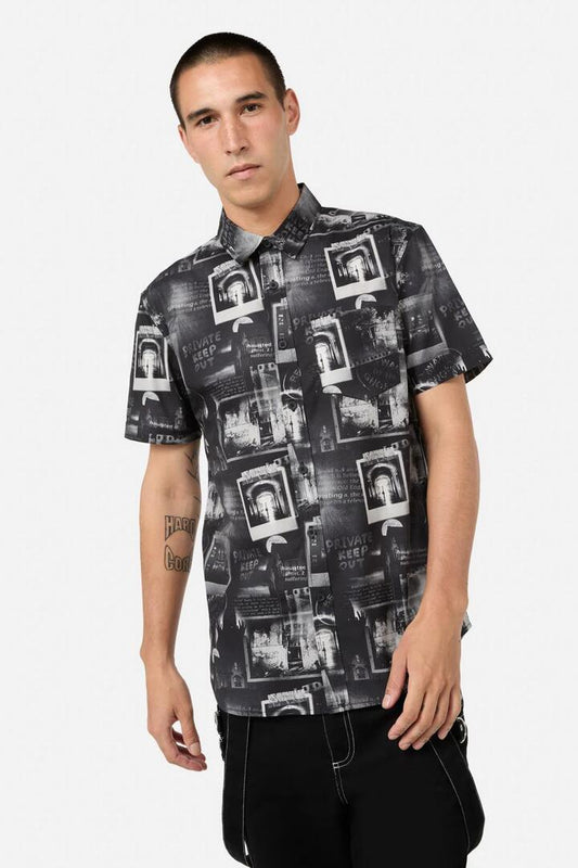 Image of a model wearing Tops. Productname: Possess SS Shirt in Black colour by brand - Black Friday