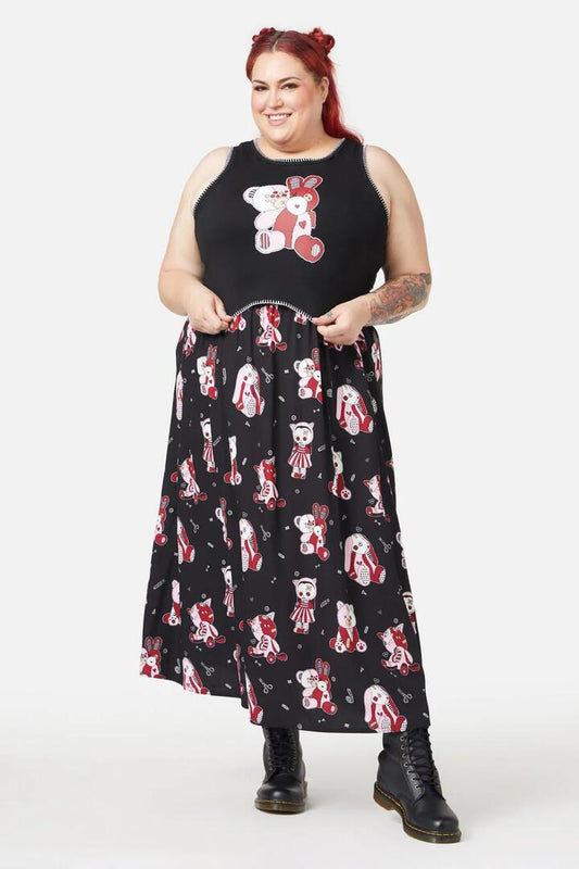 Image of a model wearing Tops. Productname: Buttons Tank in Black colour by brand - Black Friday