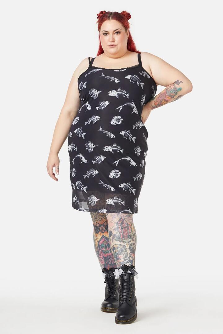 Image of a model wearing Dress. Productname: Curve Deep Dive Dress in Black colour by brand - Dangerfield