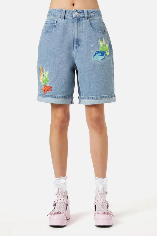 Image of a model wearing Shorts. Productname: Reef Short in Blue colour by brand - Dangerfield