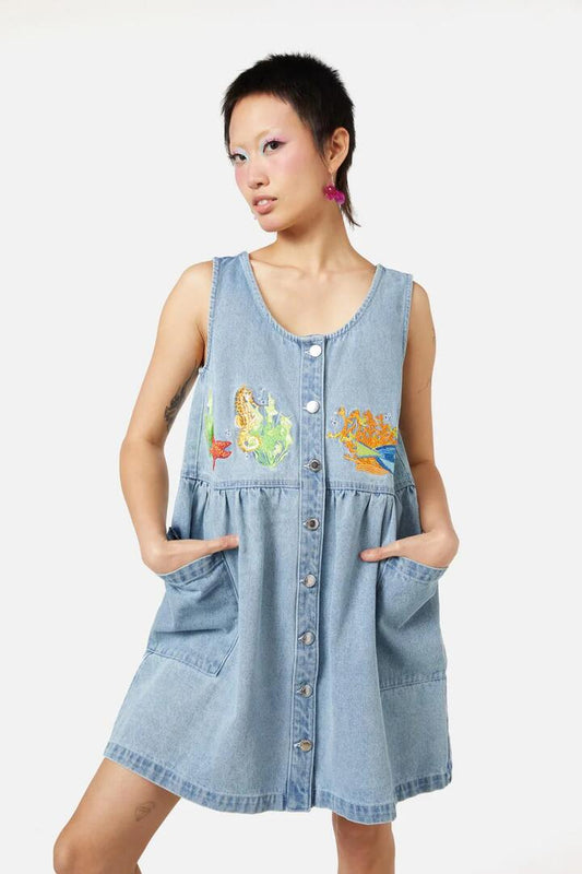 Image of a model wearing Dress. Productname: Reef Pinafore in Blue colour by brand - Dangerfield