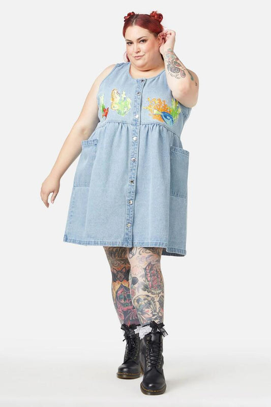 Image of a model wearing Dress. Productname: Curve Reef Pinafore in Blue colour by brand - Dangerfield
