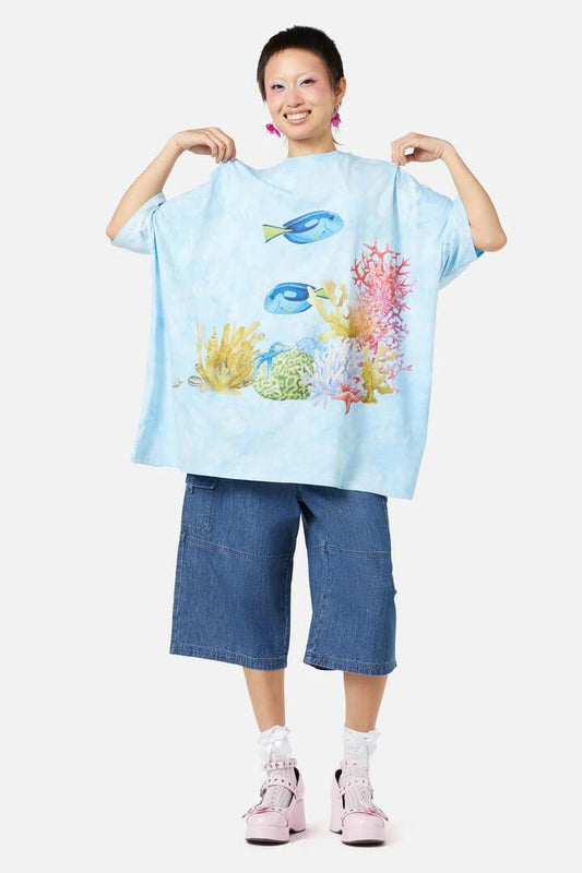 Image of a model wearing Tops. Productname: Reef Tee in Blue colour by brand - Dangerfield