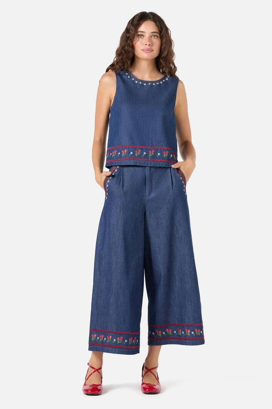 Image of a model wearing Tops. Productname: Meadow Embroidered Top in Blue Denim colour by brand - Princess Highway