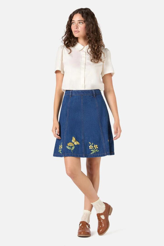 Image of a model wearing Skirts. Productname: Butterfly Embroidered Skirt in Blue Denim colour by brand - Princess Highway