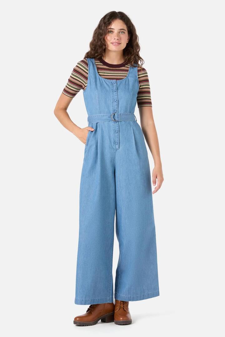 Image of a model wearing Denim. Productname: Blythe Denim Jumpsuit in Light Denim colour by brand - Princess Highway