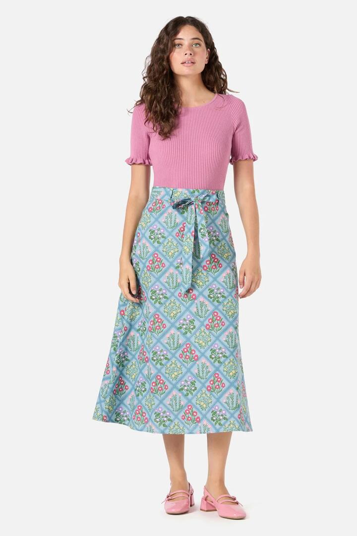 Image of a model wearing Skirts. Productname: Lattice Floral Midi Skirt in Blue colour by brand - Princess Highway