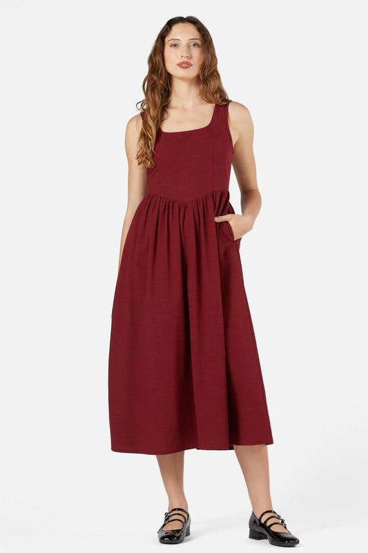 Image of a model wearing Dress. Productname: Freya Corset Midi Dress in Wine colour by brand - Princess Highway