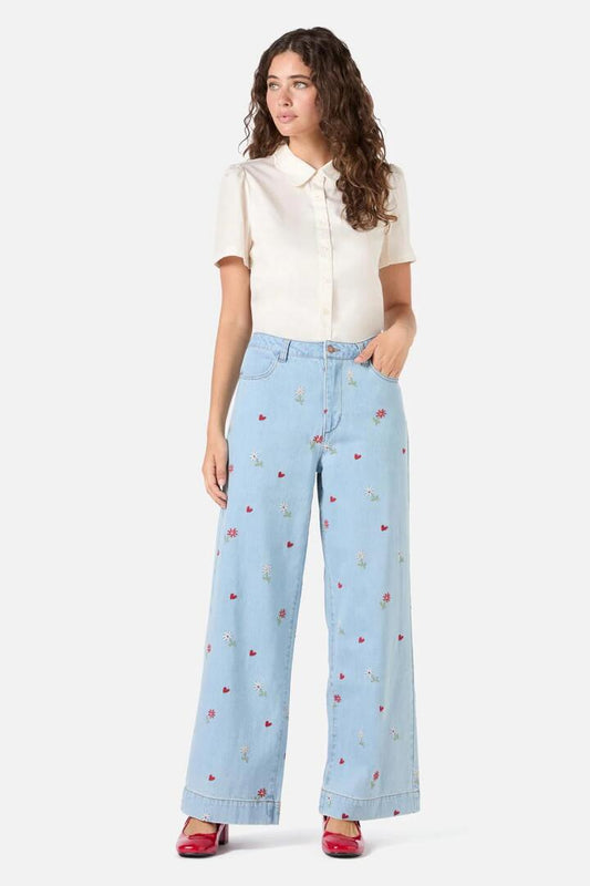 Image of a model wearing Denim. Productname: Ditsy Embroidered Jean in Blue Denim colour by brand - Princess Highway
