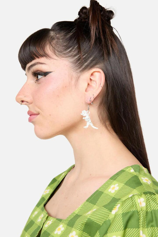 Image of Earrings. Productname: White T-Rex Earring in White colour by brand - Dangerfield