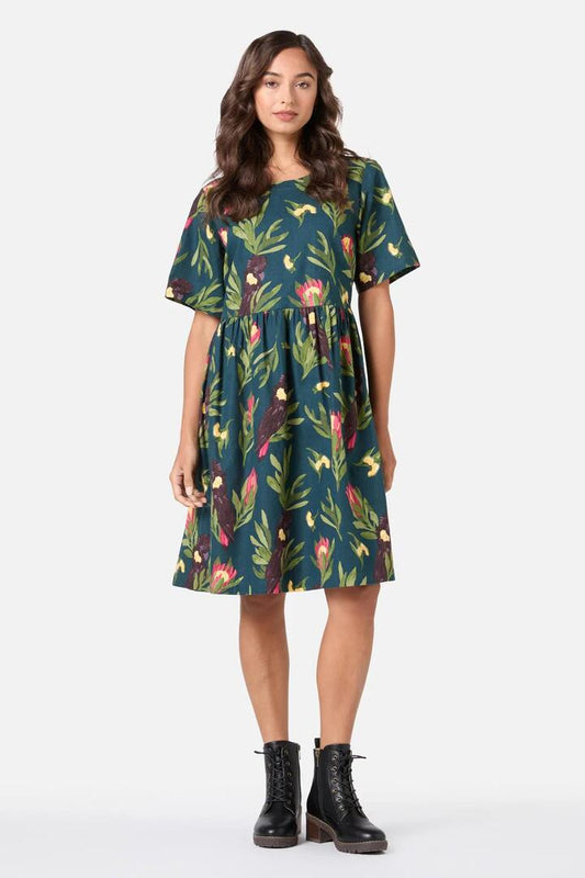 Image of a model wearing Dress. Productname: Cockatoo Smock Dress in Teal colour by brand - Princess Highway