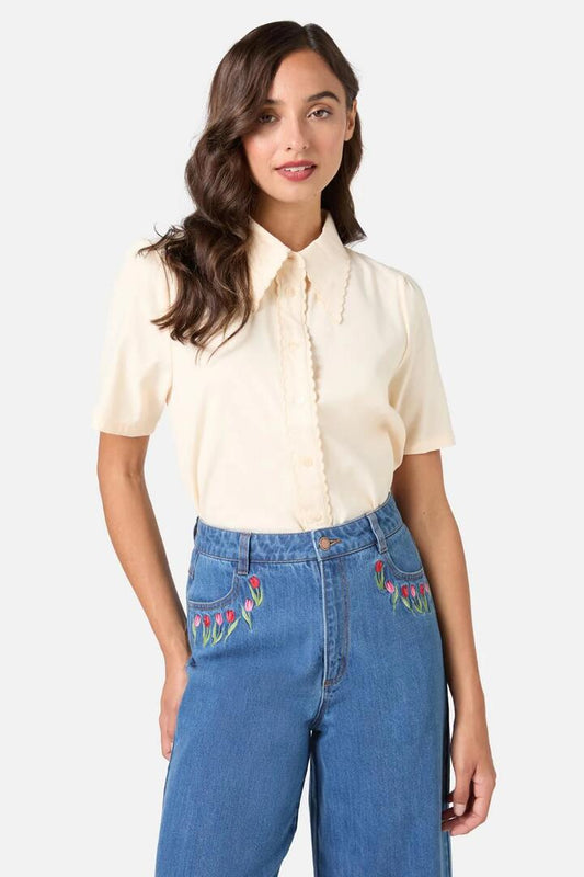 Image of a model wearing Shorts. Productname: Elouise Short Sleeve Blouse in Cream colour by brand - Princess Highway