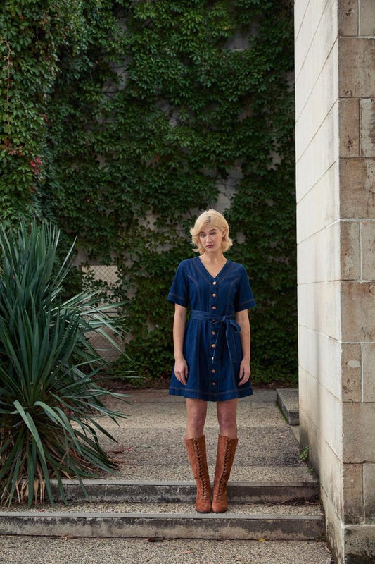 Image of a model wearing Denim. Productname: Tegan Denim Mini Dress in Blue Denim colour by brand - Princess Highway
