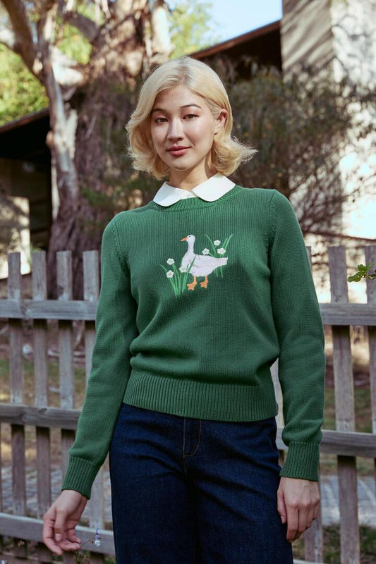 Image of a model wearing Outerwear. Productname: Goose Embroidered Knit Jumper in Green colour by brand - Princess Highway