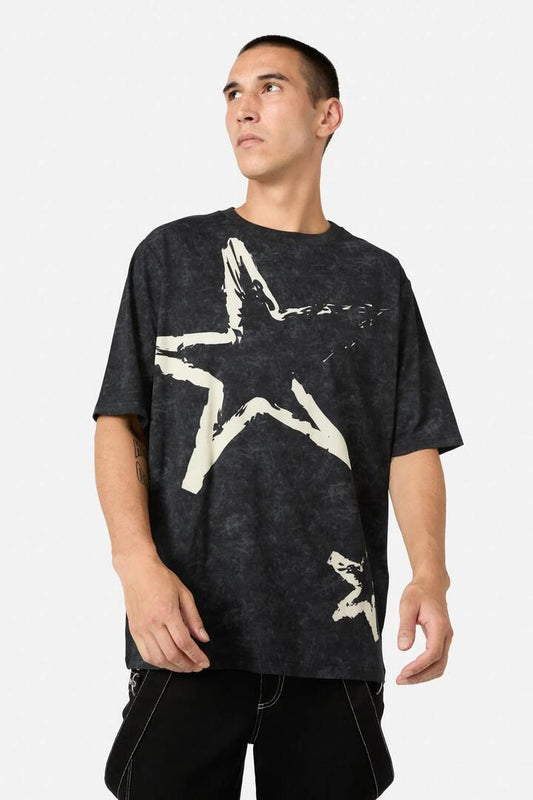 Image of a model wearing Tops. Productname: Nevermind Acid Wash Tee in Black colour by brand - Dangerfield