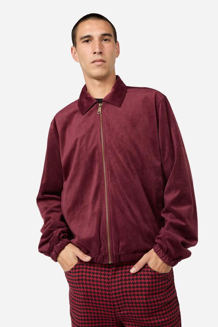 Image of a model wearing Outerwear. Productname: Unified Cord Jacket in Maroon colour by brand - Black Friday