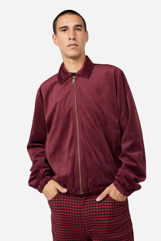 Image of a model wearing Outerwear. Productname: Unified Cord Jacket in Maroon colour by brand - Black Friday