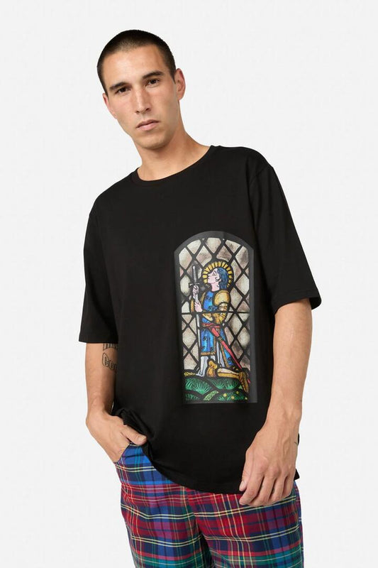 Image of a model wearing Tops. Productname: Divinity Tee in Black colour by brand - Black Friday