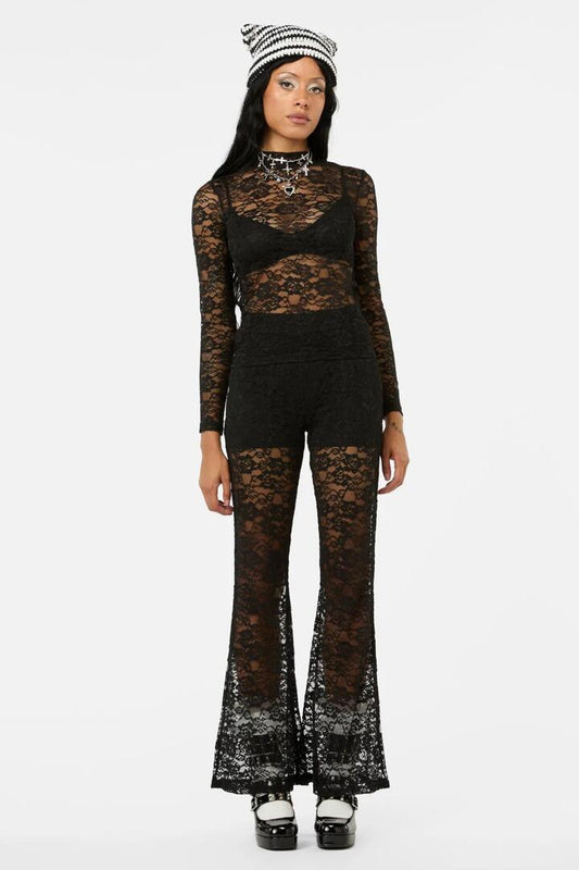 Image of a model wearing Tops. Productname: Revolution Lace LS Top in Black colour by brand - Black Friday