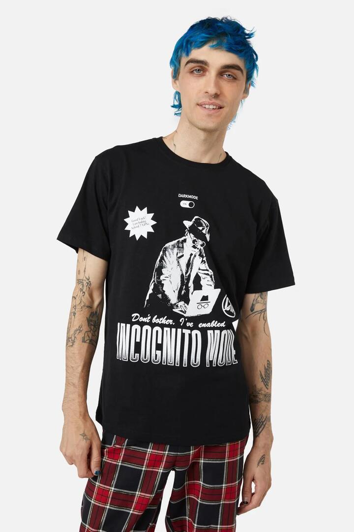 Image of a model wearing Tops. Productname: Incognito Mode Tee in Black colour by brand - Pulp Kitchen