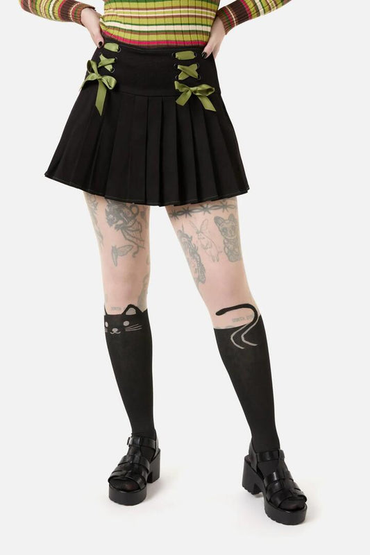 Image of a model wearing Skirts. Productname: Garden Hedge Bow Trim Skort in Black colour by brand - Dangerfield