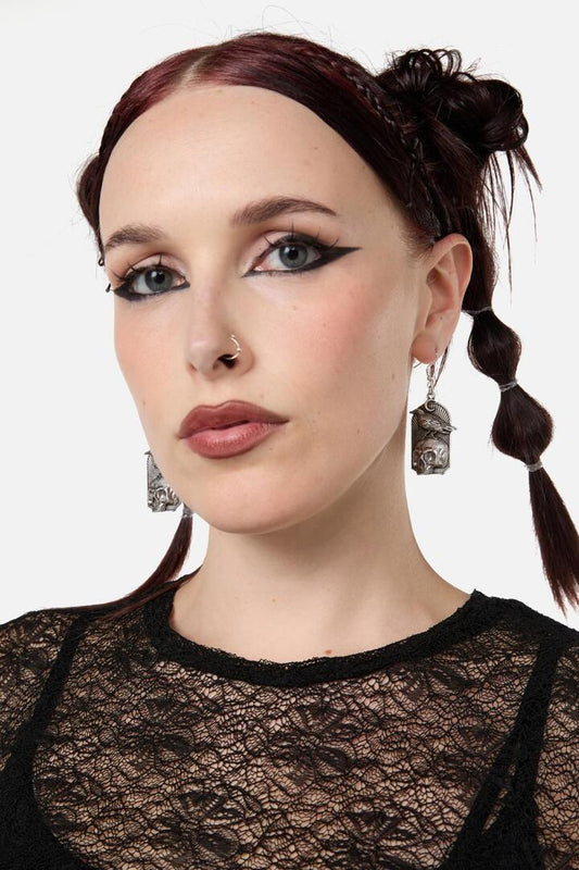Image of Earrings. Productname: Raven Skull Earrings in Silver colour by brand - Dangerfield