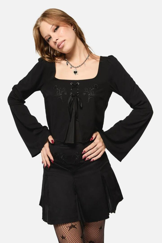 Image of a model wearing Tops. Productname: Filigree Pleat Goth Top in Black colour by brand - Black Friday
