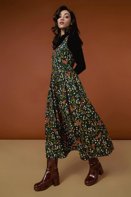 Image of a model wearing Dress. Productname: Squirrel Away Midi Dress in Green colour by brand - Princess Highway
