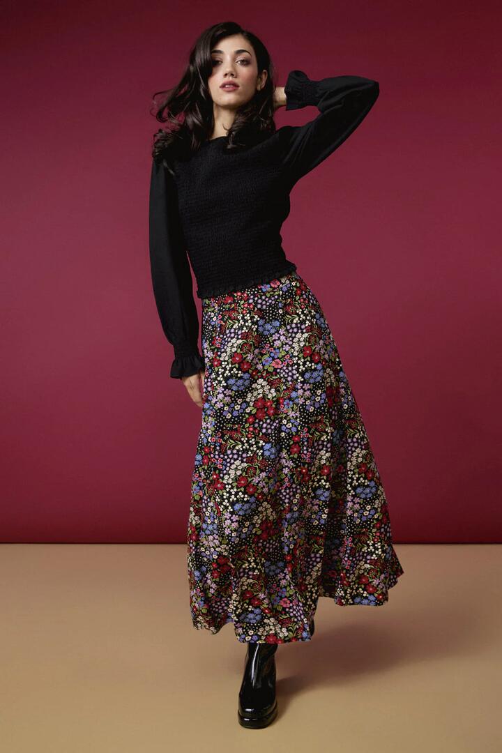 Image of a model wearing Skirts. Productname: Ada 90's Floral Midi Skirt in Red colour by brand - Princess Highway