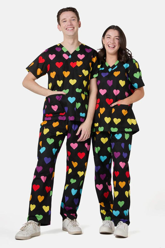 Image of a model wearing Uniforms & Workwear. Productname: Rainbow Hearts Scrub Set in Black colour by brand - Dangerfield